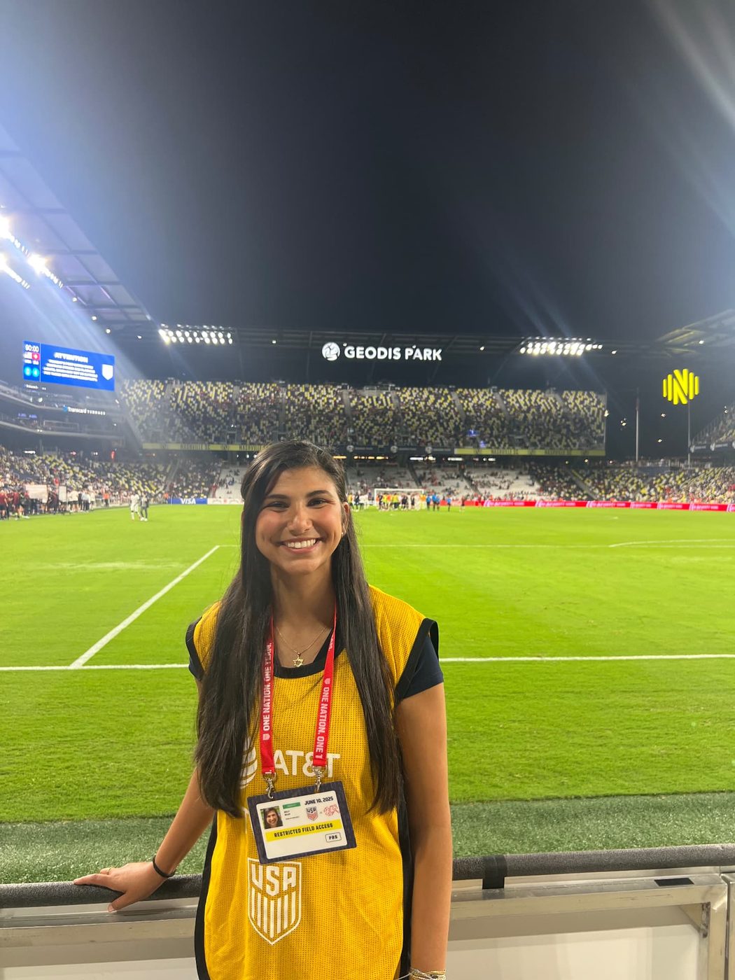 Reilly with restricted field access on the pitch at Geodis Park during a USA match